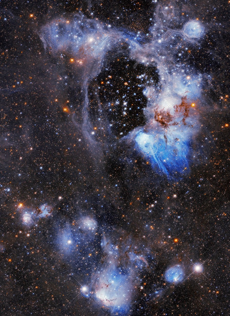 Mysterious “Superbubble” Hollows Out Nebula in New Hubble Image